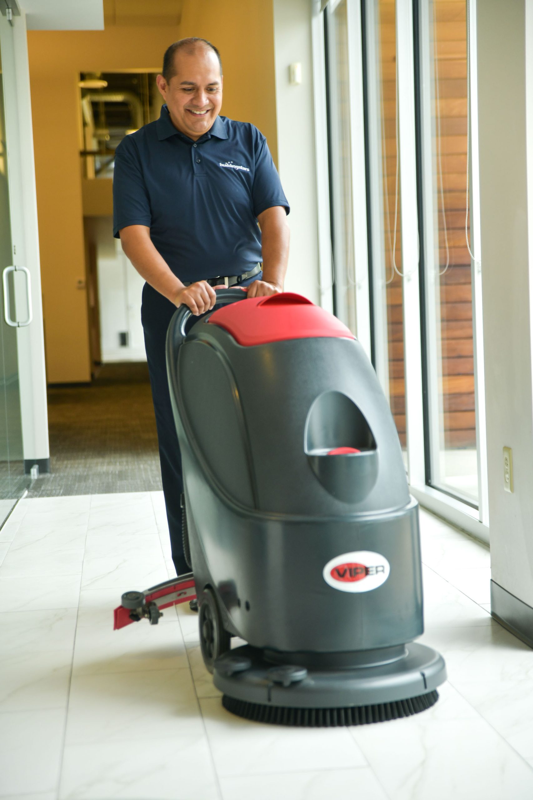 Buildingstars Technician cleaning floors